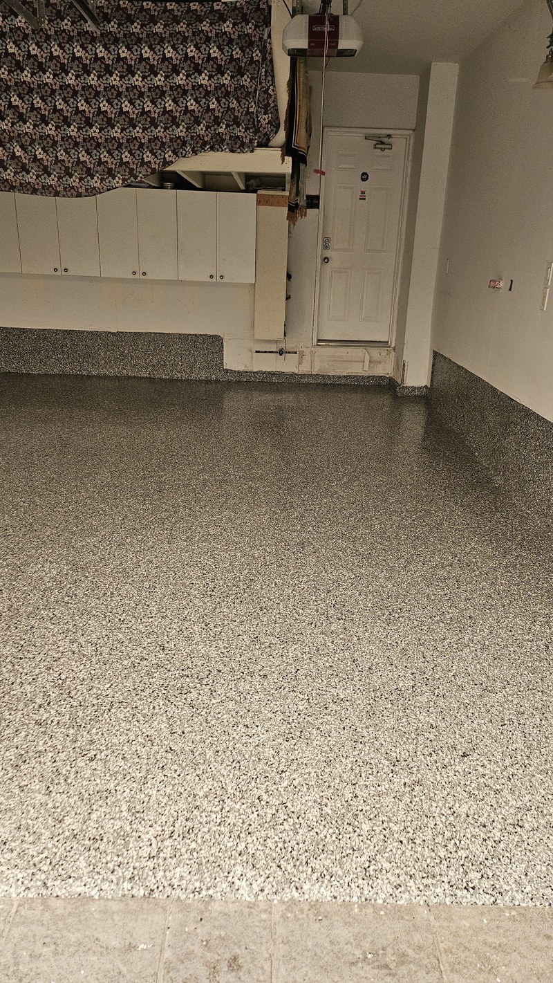 Finished right bay and entry with full flake epoxy